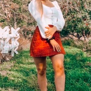 Super cute orange mini skirt